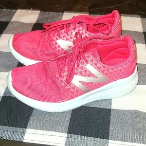 Toddler girl's New Balance tennis shoes, size 11.5